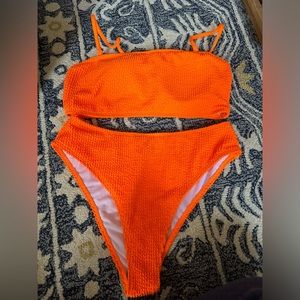 NEW bright orange bathing suit